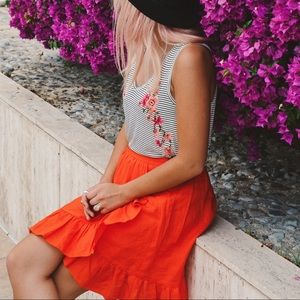 Bright orange ruffle skirt